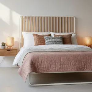 Stylish wooden headboard bed with soft bedding, emphasizing sturdy bed frames for rest and health investment.